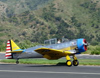 N4995C @ SZP - 1949 North American T-6G 'Thirsty Girl' (1949 factory reman), P&W R-1340 Wasp 600 Hp, Experimental class, landing roll Rwy 22 - by Doug Robertson