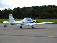 G-BYVD @ EGQL - An RAF grob Tutor on the flightline at its home base - by Mike stanners