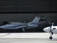 N509JA @ ONT - Being pushed back into a hanger out of the elements - by Helicopterfriend