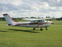 N3376R @ 4WI0 - This plane has been specially modified to accommodate skydiving with the removal of unneeded seats and the addition of a gull-wing exit door. - by Malcolm Paine