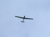 G-BMLK - G.109B Motorised glider flying over the top of Blue dolphin caravan park,Filey,England