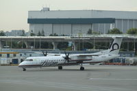 N405QX @ CYVR - DHC-8-400