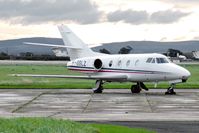 F-GSLZ @ EGNV - Dassault Falcon 100 at Durham Tees Valley Airport in September 2004. - by Malcolm Clarke