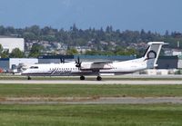 N414QX @ CYVR - DHC-8-400