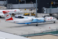 OE-LGJ @ VIE - Austrian arrows DH8D - by Chris J