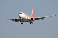 G-EZKF @ EGNT - Boeing 737-73V on approach to Rwy 25 at Newcastle Airport in September 2006. - by Malcolm Clarke