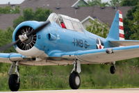 N1666T @ 06C - North American SNJ-5B, departing RWY 11 06C (Schaumburg, IL). - by Mark Kalfas