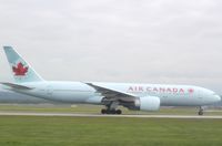 C-FNNH @ CYVR - Boeing 777-200LR - by Mark Pasqualino