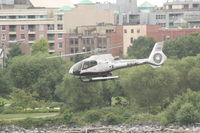 N165WC @ CYVR - Eurocopter taking off from Helipad at Waterfront, Vancouver - by Shubhashish
