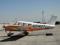 N2140T @ CCB - Parked on eastside pf Maniac Mike's - by Helicopterfriend