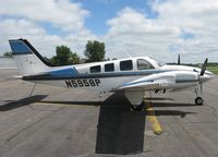N5958P @ KAXN - Beech 58P Baron on the line. - by Kreg Anderson