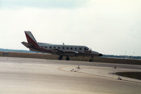 N78CZ @ MCO - Embraer Bandeirante of Comair taxying to the active runway at Orlando in November 1987. - by Peter Nicholson