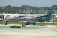 N11165 @ KORD - 2004 Embraer EMB-145XR, c/n: 14500819 at Chicago O'Hare - by Terry Fletcher