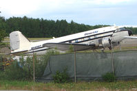 N44587 @ PANC - Desert Air's 1944 Douglas DC3C, c/n: 12857 stored at Anchorage - by Terry Fletcher