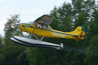 N51446 @ LHD - 1966 Cessna 305A, c/n: 2013 landing at Lake Hood - by Terry Fletcher