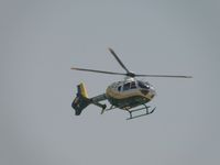 N819CE @ ONT - Landing on the southside of Ontario at SCE hanger - by Helicopterfriend