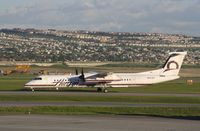 N407QX @ CYYC - DHC-8-400