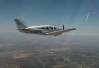 N4201B - Bellanca Super Viking over Los Angeles - by Lance Turk