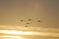 G-YFUT @ EGFH - Five ship formation of Yak-52 aircraft including G-YFUT returning to Swansea Airport after formation aerobatics practice. - by Roger Winser