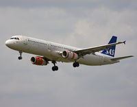OY-KBL @ EBBR - Happy me : while on short final rwy 25L, this stretched version shows different engine caps colors. One fully orange and the other one striped. - by Philippe Bleus