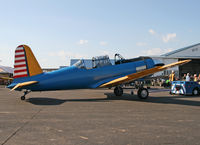 N56530 @ KRDG - A Colorful Vultee Vibrator shows off her colorful plumage at the Wolrd War II Weekend. - by Daniel L. Berek