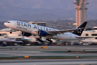 N218UA @ LAX - United Airlines N218UA departing departing RWY 25R late in the day. (1/60 sec).