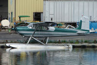 N9464C @ LHD - 1955 Cessna 180, c/n: 31862 on dock at Lake Hood - by Terry Fletcher