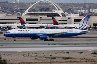 N595UA @ LAX - United Airlines N595UA (FLT UAL817) on the center taxiway after arrival from San Francisco Int'l (KSFO) on RWY 25L.