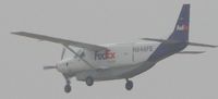 N864FE @ ONT - On final to Ontario for Fed Ex on a gloomy morning - by Helicopterfriend