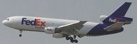 N367FE @ ONT - Lumbering in for a landing on 26L - by Helicopterfriend