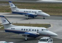 HI-874 @ TNCM - HI-874 park at the cargo ramp at TNCM