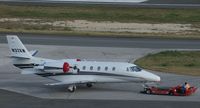 N32KM @ TNCM - N32KM being push to it's parking place on the cargo ramp at TNCM