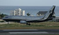 VP-BRT @ TNCM - VP-BRT over the lines at TNCM runway 10