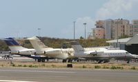 XA-GME @ TNCM - XA-GME park at the private ramp at TNCM - by Daniel Jef