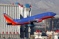 N627SW @ LAS - Southwest Airlines N627SW (FLT SWA1789) climbing out from RWY 1R, in front of the Excalibur Hotel, enroute to Ontario Int'l Airport (KONT).