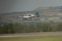 N74714 @ KBIL - Mooney - by cliffpov