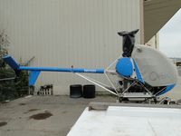 N5113Y @ CMA - Parked, covered and waiting to be put back together - by Helicopterfriend
