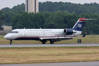 N434AW @ ORF - Not a standard regularly-scheduled flight, US Airways Express (Air Wisconsin) N434AW (FLT AWI9365) from Myrtle Beach Int'l (KMYR) rolling out on RWY 5.