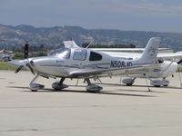 N508JD @ CMA - Parked, tied down and covered from the weather - by Helicopterfriend