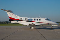 OE-FGR @ LOWW - Embraer Phenom