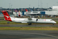 VH-QOC @ YSSY - At Sydney - by Micha Lueck