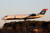N469AW @ ORF - US Airways Express (Air Wisconsin) N469AW (FLT AWI47071) from Reagan National (KDCA) landing RWY 5 late in the day.