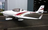 G-OZIO @ EGBT - Hex: 406101 - by Clive Glaister
