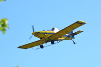 N2378Q - Working the field just west of my neighborhood.  Watching from my back yard in North Liberty Iowa