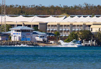 VH-NTK - This aircraft is currently used for joy flights and sight seeing around the Southport Seaway on the Gold Coast, Queensland. Here it is landing out front of the Volunteer Marine Rescue base on the Southport Spit. - by aussietrev