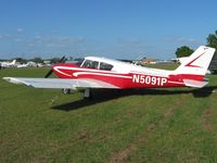 N5091P @ ZPH - In the grass at Zephyrhills, Florida - by Bob Simmermon