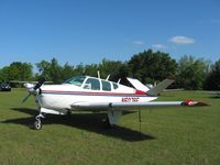 N6076E @ ZPH - In the grass at Zephyrhills, Florida - by Bob Simmermon