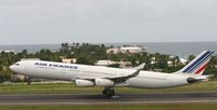 F-GNIF @ TNCM - Air France F-GNIF touching down at TNCM runway 10 - by Daniel Jef
