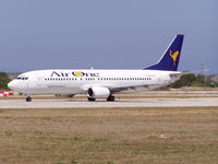 EI-CWX @ LMML - Air One B737 lining up Runway 32 for departure. - by raymond