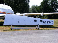 G-ASJB @ EGLB - Wing section of G-ASJB which was written off at Wisley after a heavy nosewheel-first touchdown, the aircraft bounced to about 50ft. It then struck the runway again in a nose-down attitude. The landing gear collapsed and the right main gear broke off. - by Chris Hall